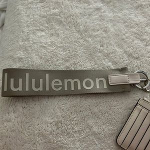Lululemon Never Lost Keychain in White Opal